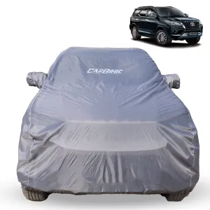 CARBINIC Car Body Cover for Toyota Fortuner 2022 | Water Resistant, UV Protection Car Cover | Scratchproof Body Shield | Dustproof All-Weather Cover | Mirror Pocket & Antenna | Car Accessories, Grey