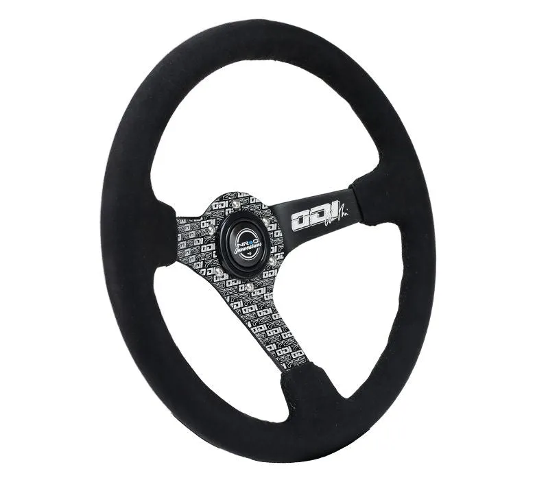 NRG Reinforced Steering Wheel - Odi Bakchis Signature 3" Deep, 5 mm spoke with solid spokes. Odi Signature finish solid spokes wrapped in Micro Fiber Finish.  - RST-036MB-ODI
